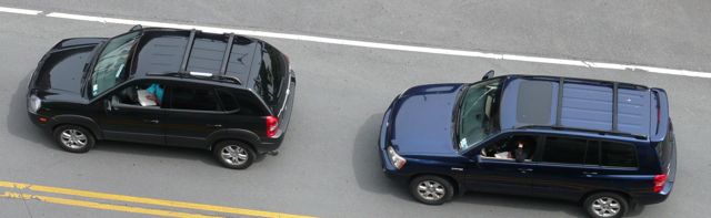 That's not the script...bored drivers find time to read between shots
